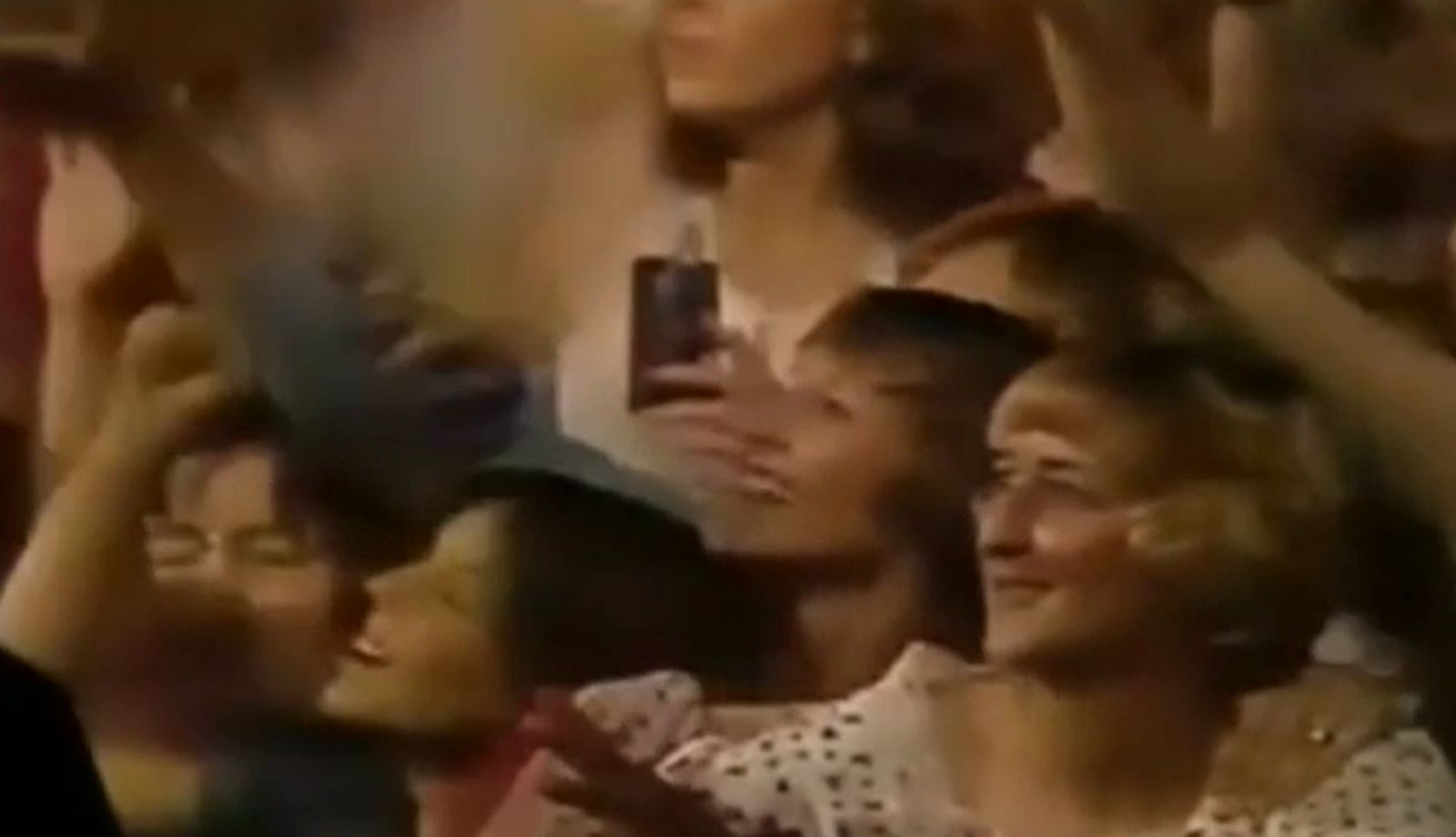 Elvis Presley concert video featuring possible time traveler with iPhone